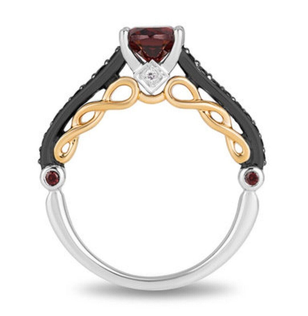 Oval Garnet and 1/4 CT. T.W. Diamond Ring in 2 Tone Sterling Silver and 10K Gold